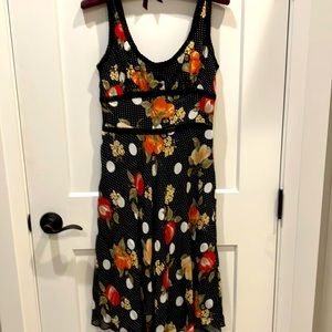 Mica. Size4. Polka dot with Peaches and apples. Black lace trim. Zipper back.